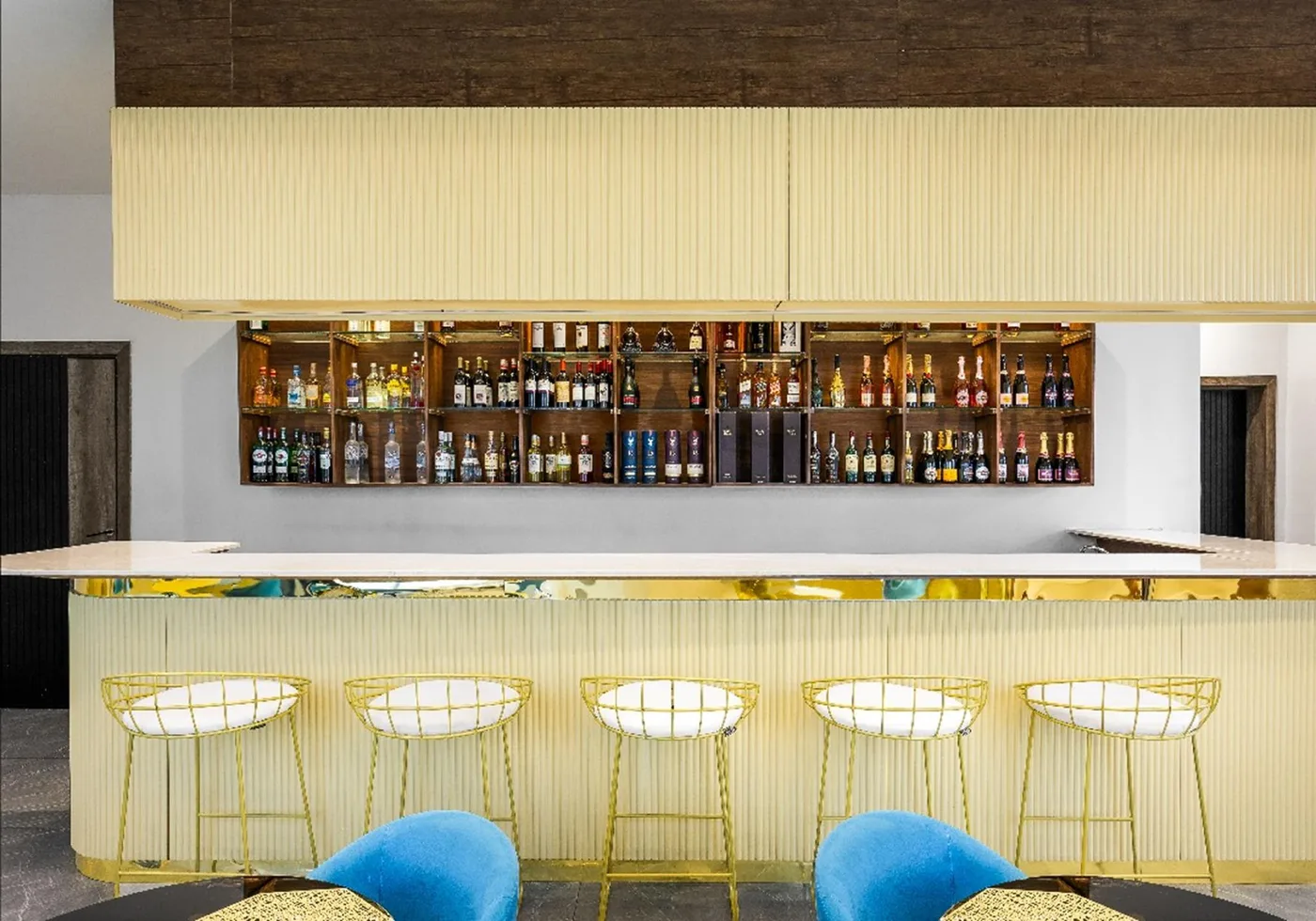 Bar with cream fluted front and gold trim